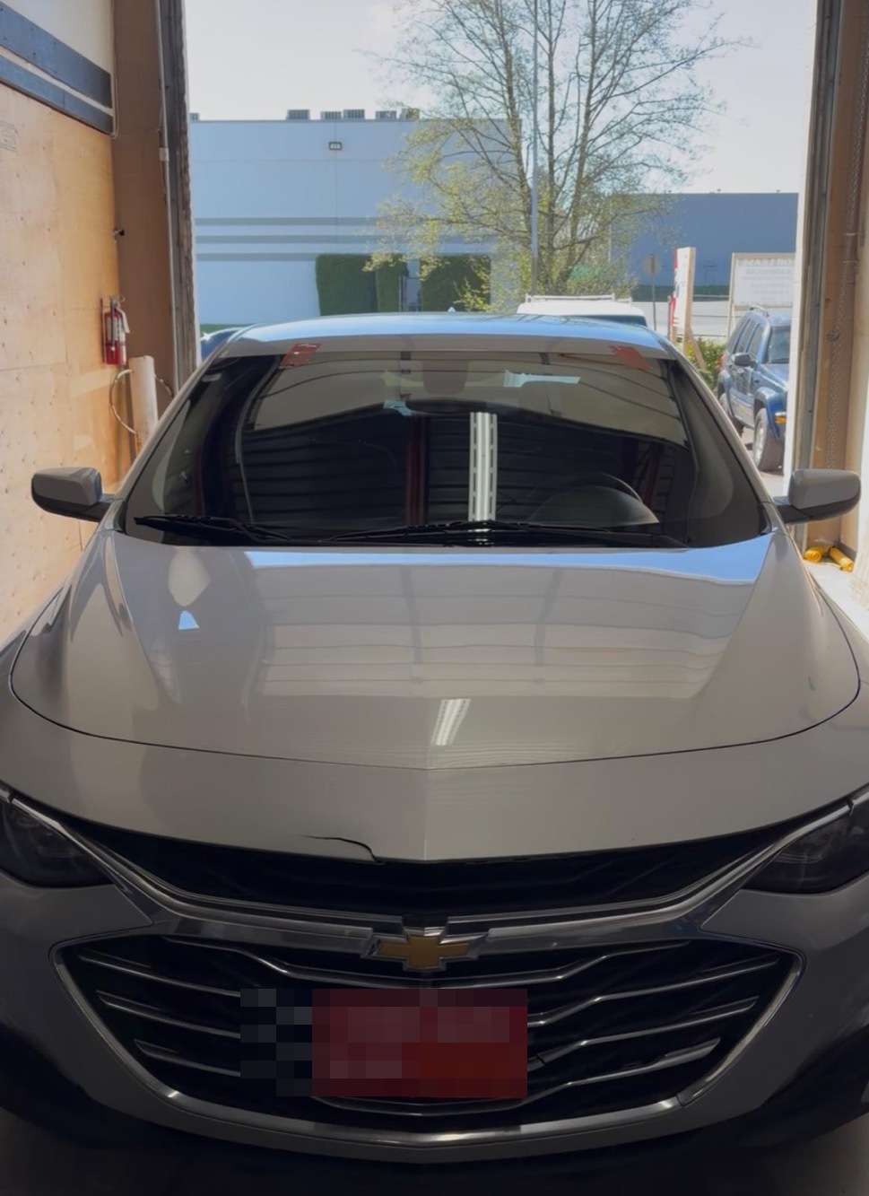Auto glass replacement on a Chevrolet Malibu in Surrey BC
